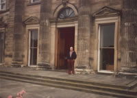 Cameron Clare Campbell in front of school